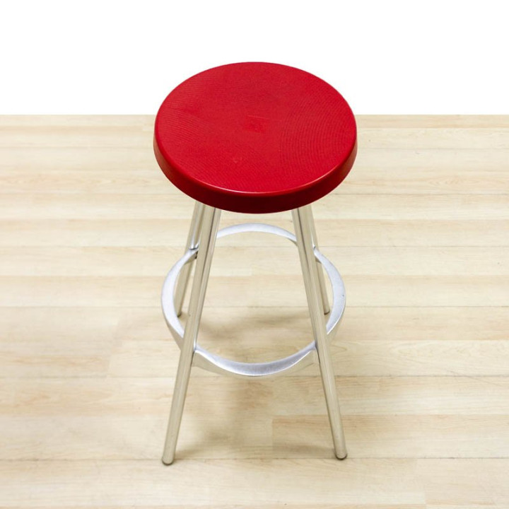 Mod. KIREN stool. Seat made of red PVC. Metallic structure.