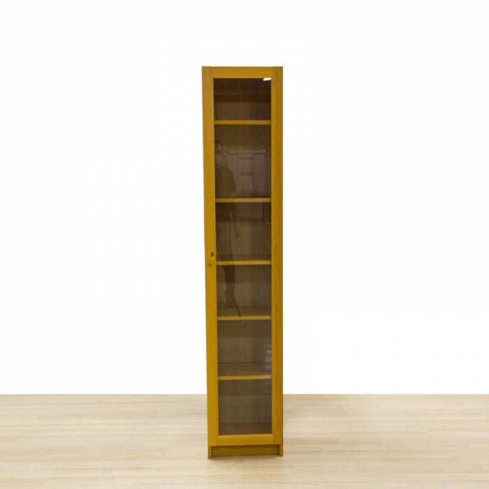 Column cabinet Mod. TASAM. Made of oak-colored wood. Glass door.