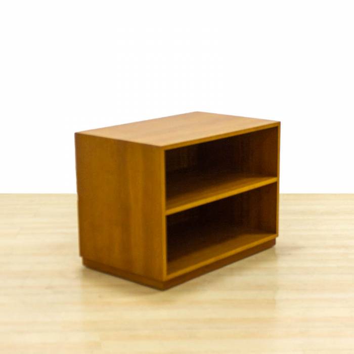 Low mobile shelving Mod. MAVEL. Made of cherry wood finish. With wheels.