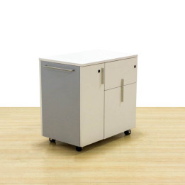 Mod COMBI base cabinet. Made of white and gray wood. With wheels.