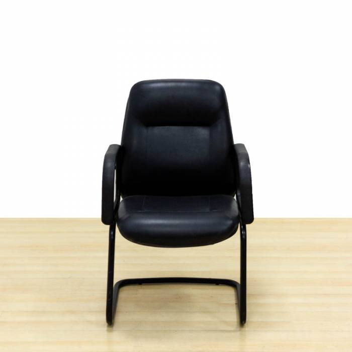 Confidant chair Mod. MEMORY. Upholstered in black leather. Skate base.