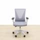 Task chair Mod. TIRAN. Seat upholstered in gray. Mesh back.