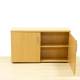 Low wardrobe Mod. PENDE. Made of beech finished wood. Folding doors.