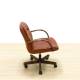 Operating chair Mod. HARD. Upholstered in brown leatherette. Wooden arms and swivel base.