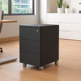 En ambiente de oficina, la cajonera Kubo estrecha de Ofitres en color negro con tres cajones y cerradura