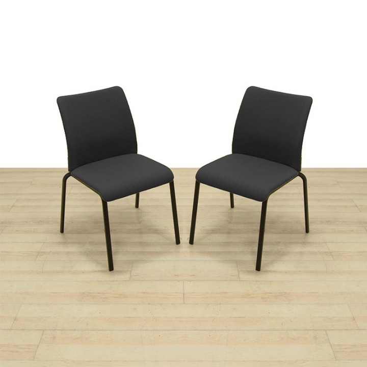 Dos sillas confidente Steelcase EASTSIDE color negro, apilables y con carcasa trasera de PVC