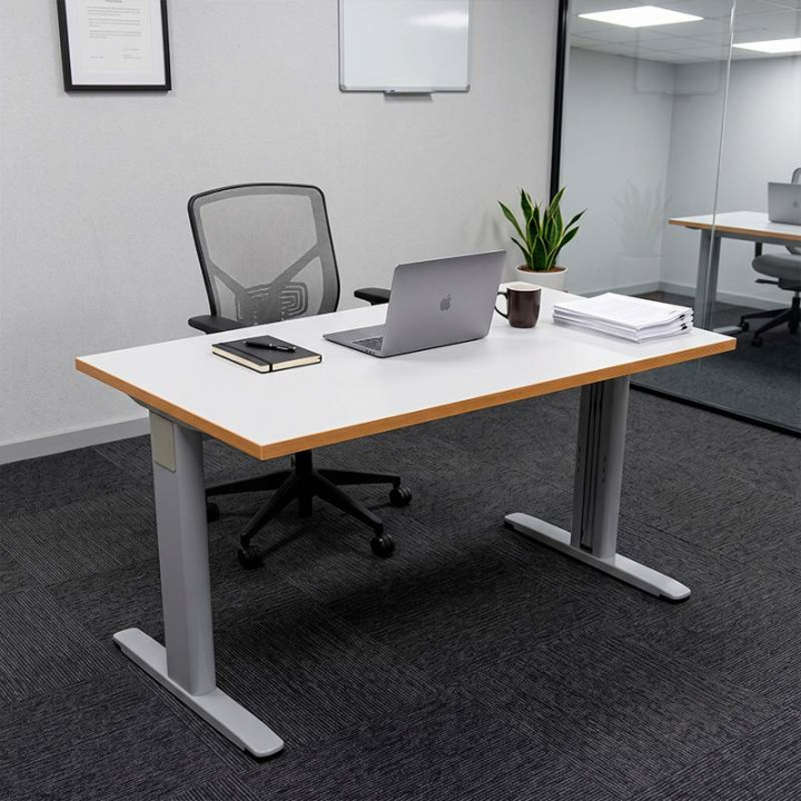 Straight gray table with beech edges from Permasa .