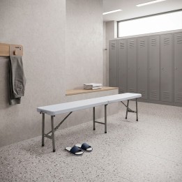 Folding dining bench in white and black steel structure.